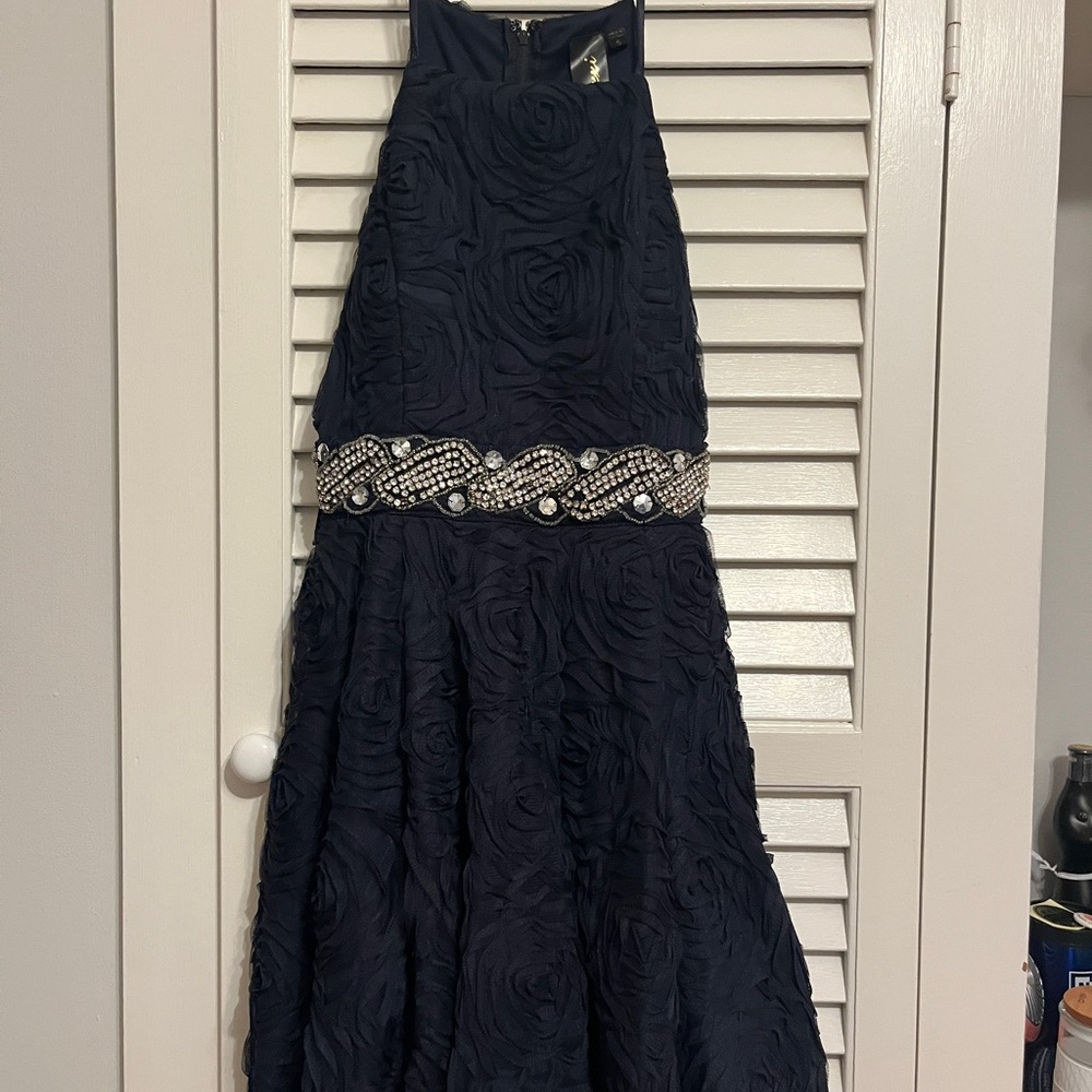 Elegant Black Textured Dress with Embellished Waist